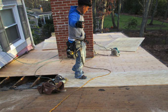 Man Working on Roof